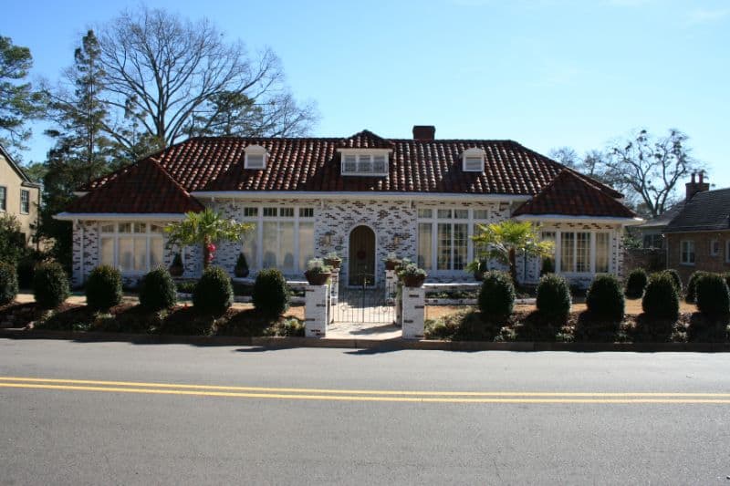 Luxurious residential landscape design by John Russell Landscape Architect featuring elegant front yard landscaping and curb appeal.