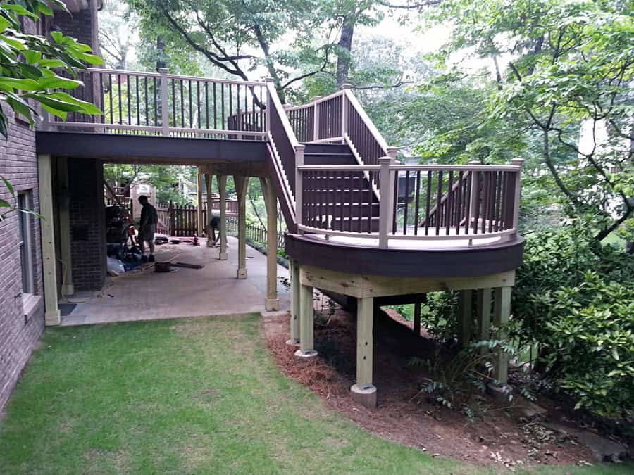 Impressive deck and balcony design by John Russell Landscape Architect, integrating outdoor living spaces with natural surroundings, showcasing expert craftsmanship and landscape integration.