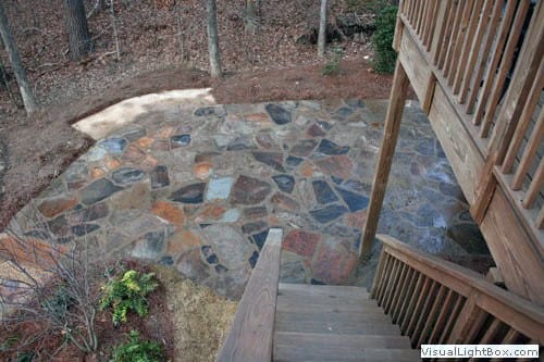Natural stone patio design by John Russell Landscape Architect, outdoor stone paving, landscape architecture, backyard makeover, garden design, custom stone patios, outdoor living spaces.
