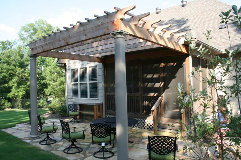 Wood pergola outdoor patio design by John Russell Landscape Architect, featuring elegant columns and shading structure, perfect for garden entertaining and landscape architecture.